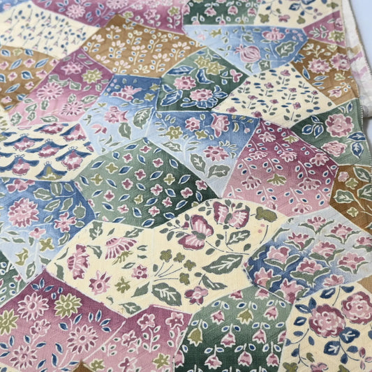 Detailed view of vintage silk Jacquard kimono fabric in pastel colour with gorgeous floral pattern. 