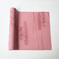 Vintage Japanese silk kimono fabric in pale purple with a pink tone, featuring a bamboo motif.