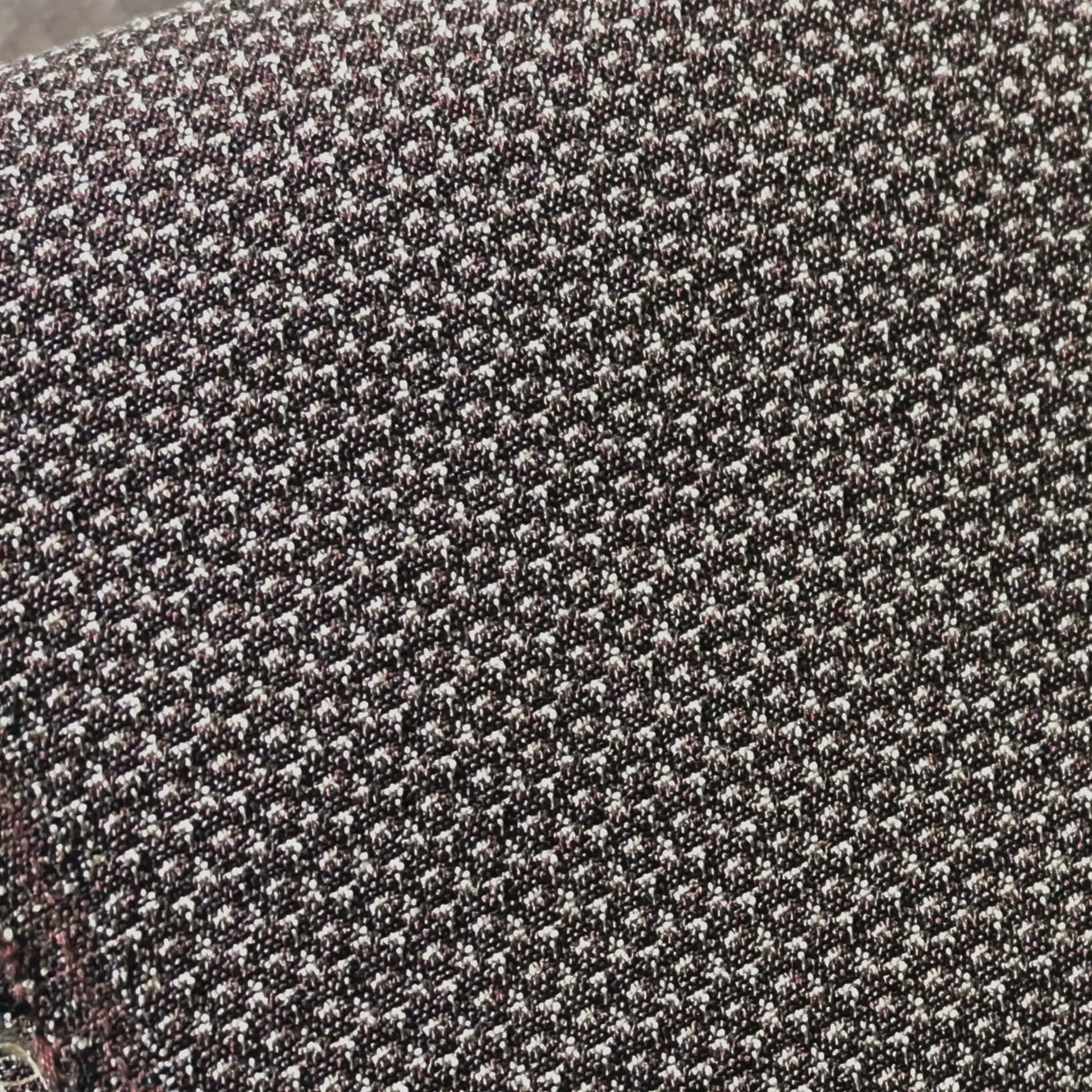 Close-up view of vintage silk men's kimono fabric in soft mocha brown with tiny tortoise-shell woven pattern.