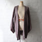 Vintage women's silk textured all-over shibori haori in black and red-pink. 