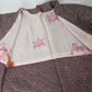 Vintage women's silk textured all-over shibori haori in black and red-pink. 
