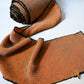 Vintage silk shibori kimono fabric bolt in orange and black, unfinished, yunoshimae.