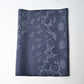 Vintage tsumugi silk kimono fabric with katazome floral arabesque pattern in soft indigo tones.