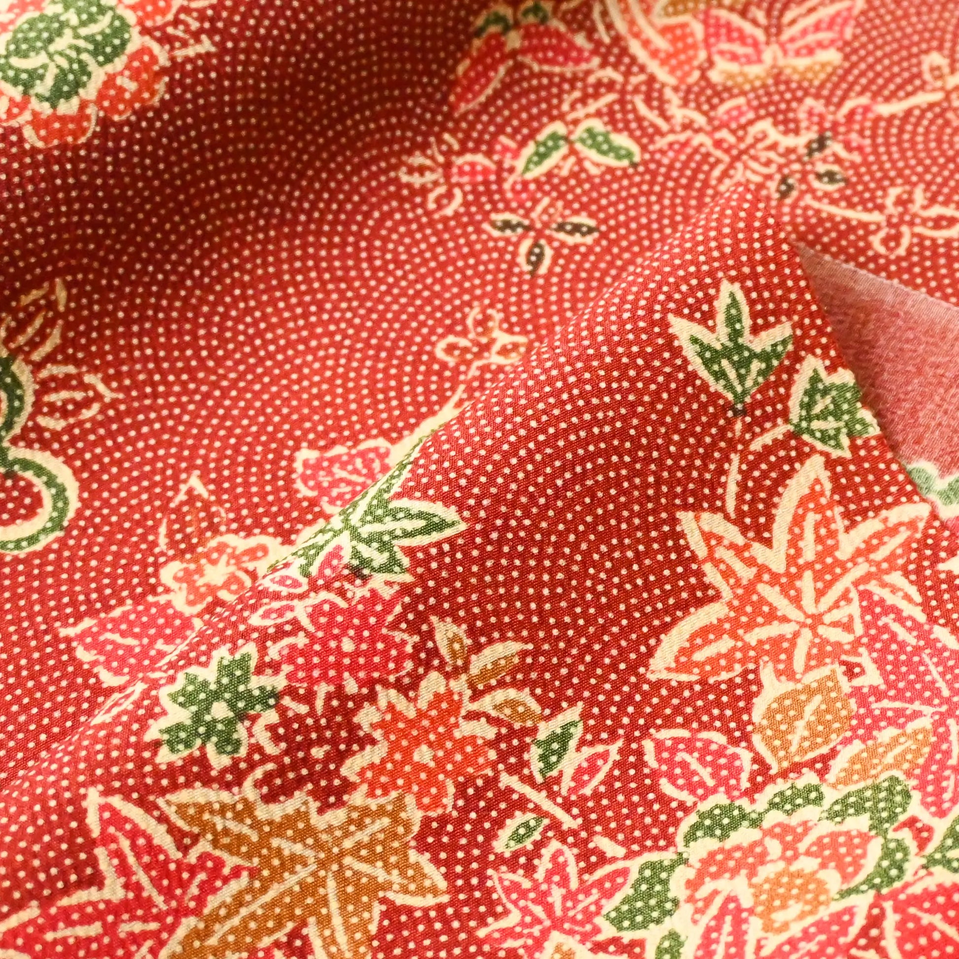 Details view of vintage Japanese silk wool red floral kimono fabric, drapes beautifully.