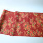 Full view of vintage Japanese silk wool red floral kimono fabric.