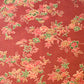 Vintage Japanese silk wool kimono fabric in deep red with pretty floral pattern.