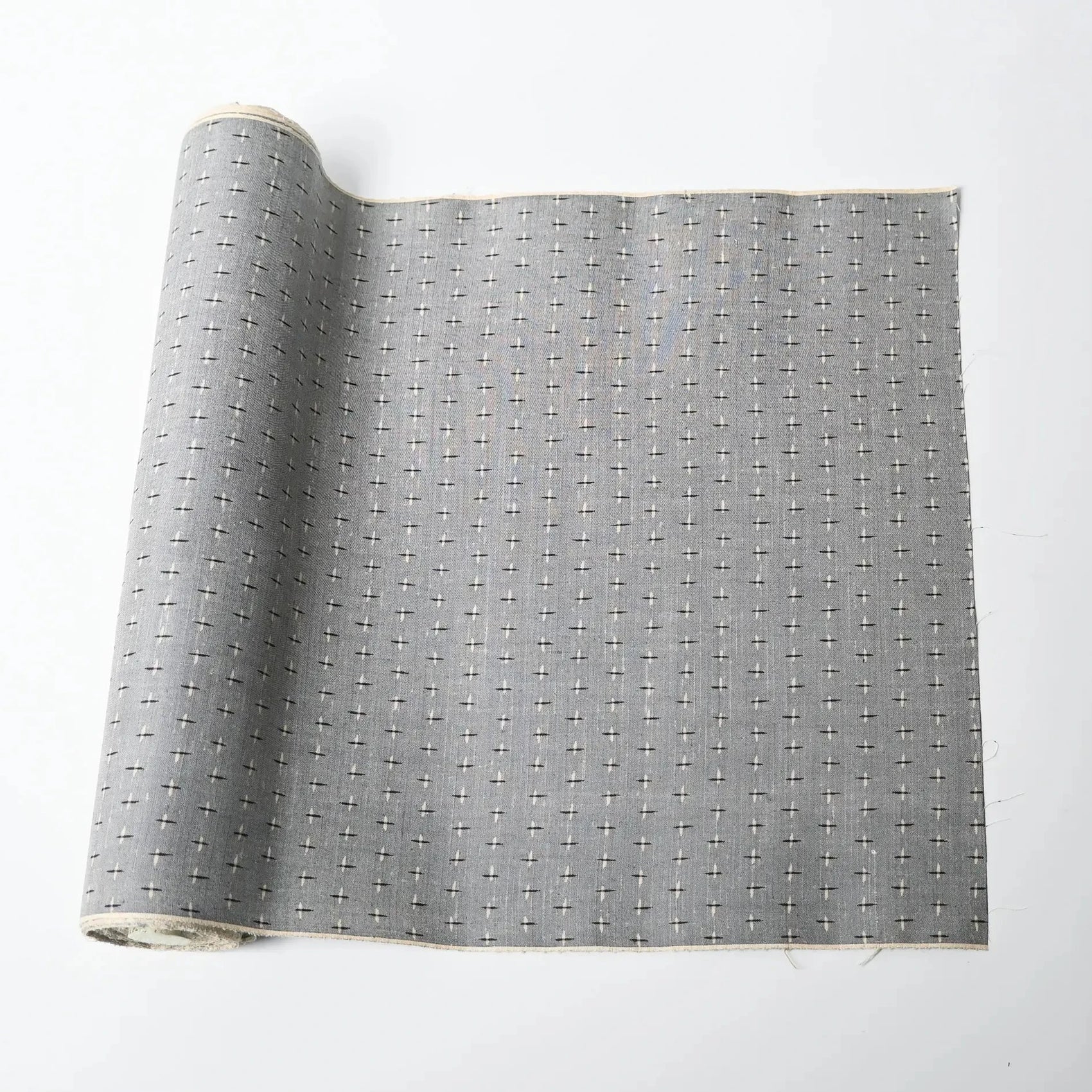 Vintage soft blue-grey tsumugi kimono silk with small kasuri crosshatch pattern.