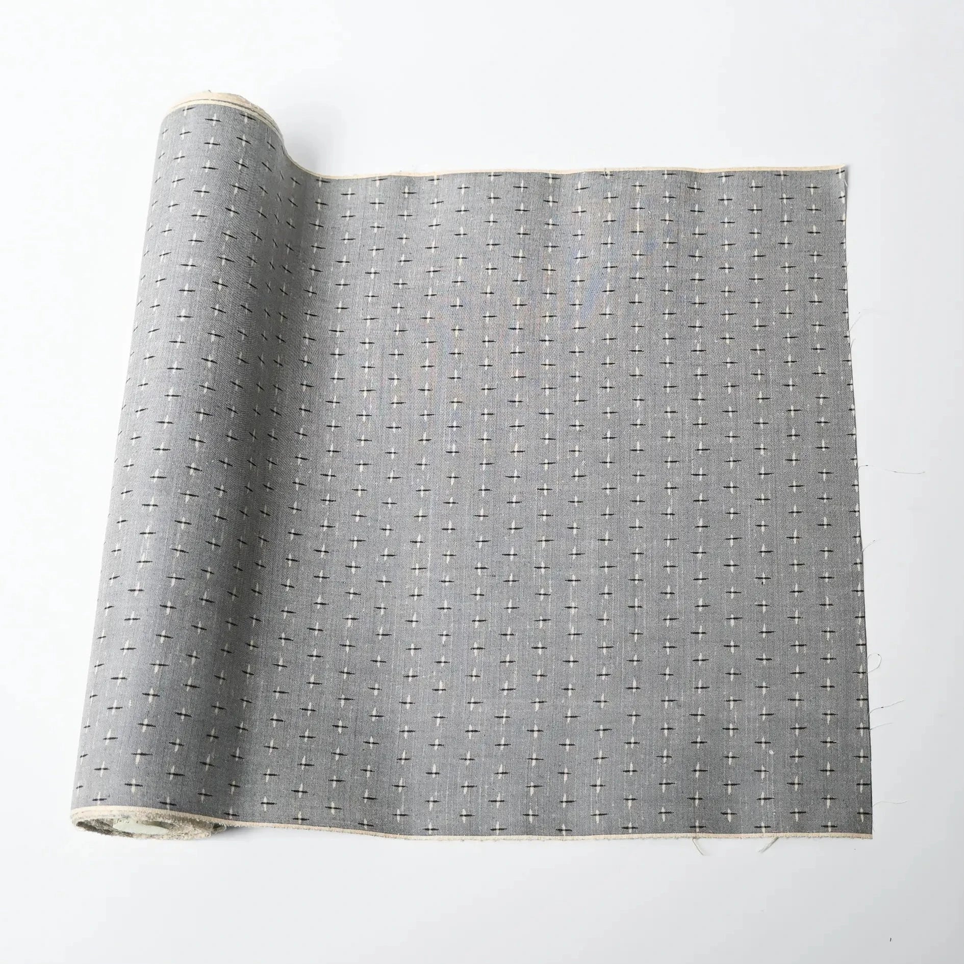 Vintage soft blue-grey tsumugi kimono silk with small kasuri crosshatch pattern.