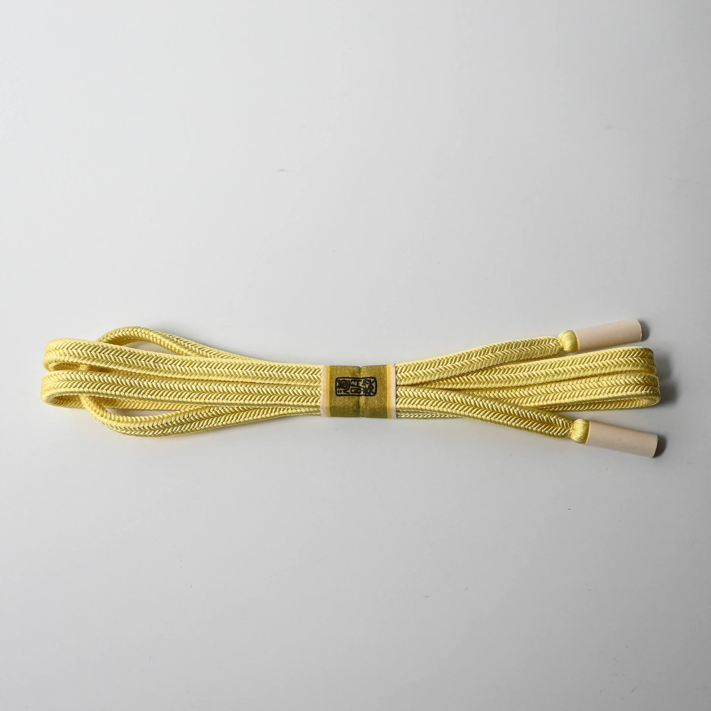 Vintage soft yellow silk obijime kumihimo cord dyed with Kihada, unused condition.