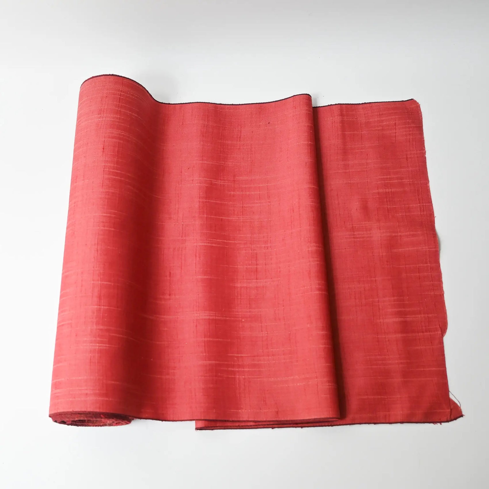Vintage strawberry red tsumugi silk kimono fabric sold by the metre.