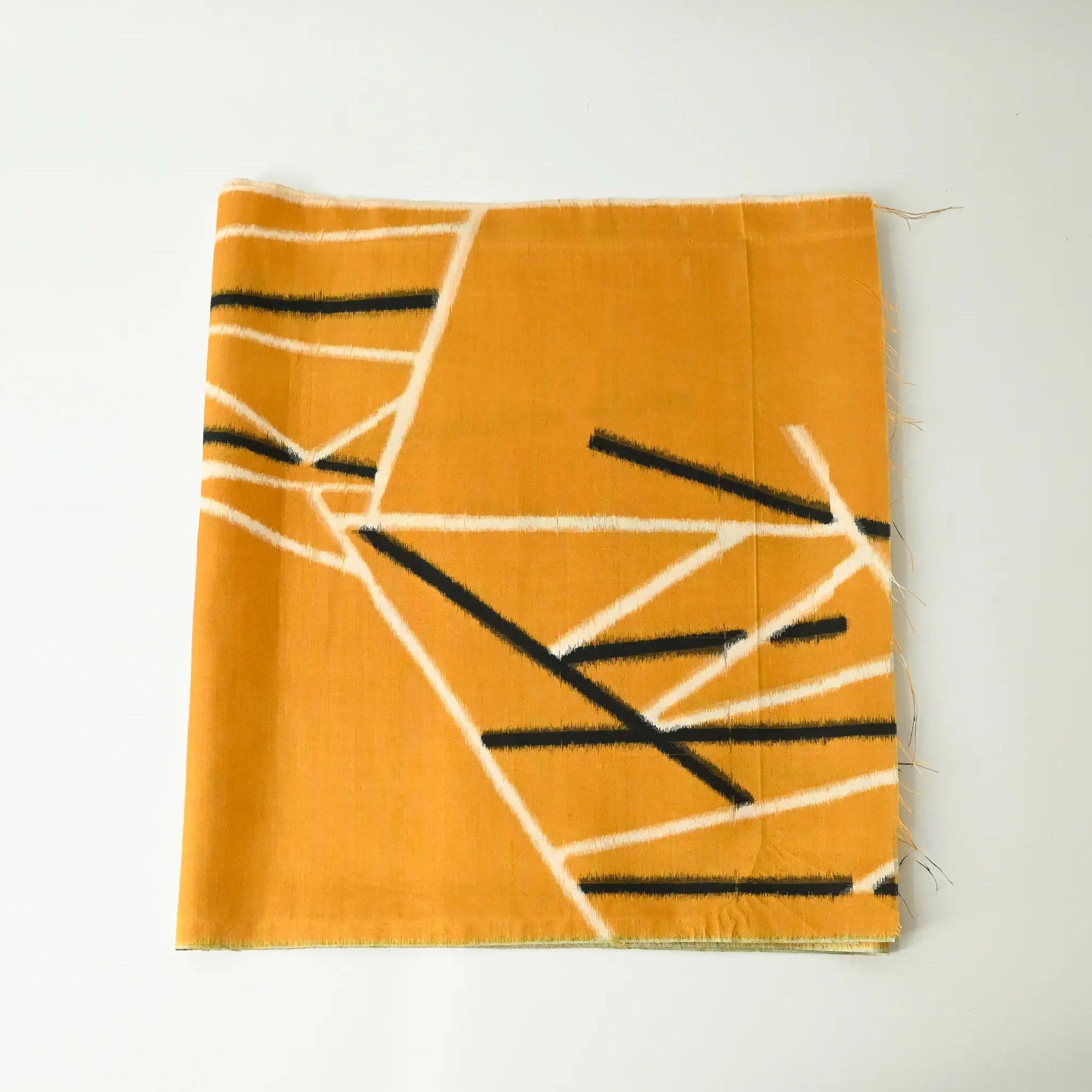 vintage Japanese Meisen kimono silk piece in striking yellow with black and white line motif from the mid-20th century.