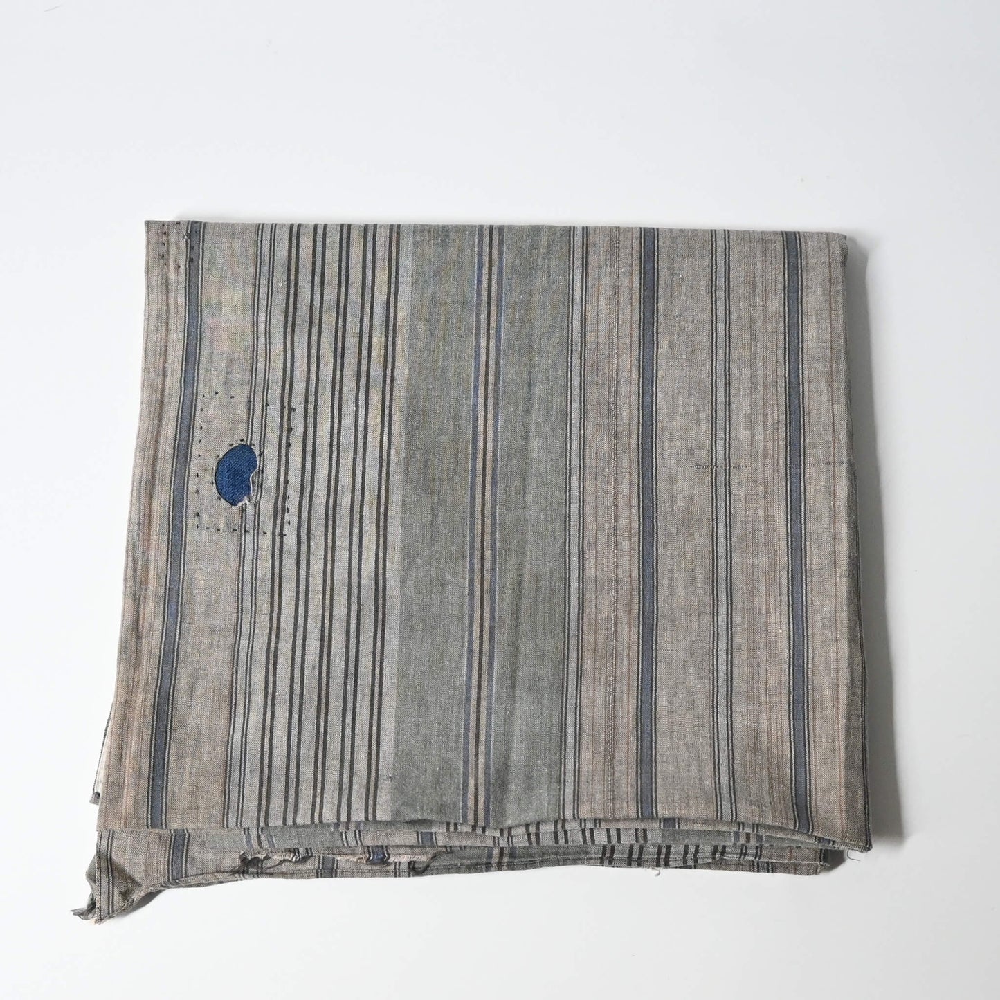 Vintage stripe cotton furoshiki in soft grey tone, with some mended patches with indigo cottons.