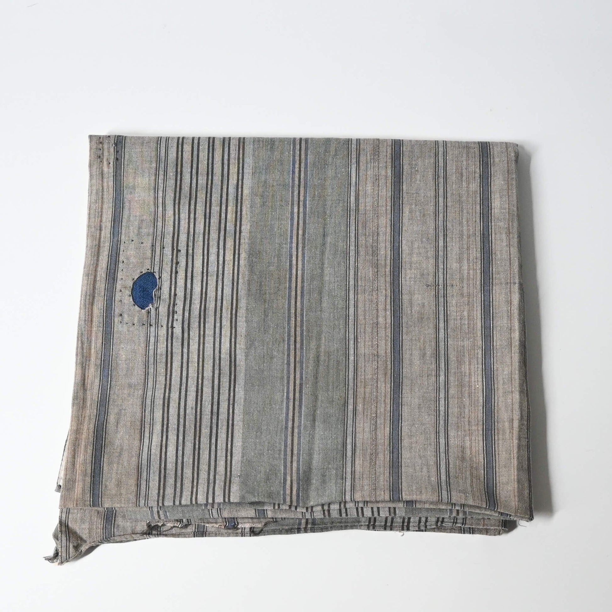 Vintage stripe cotton furoshiki in soft grey tone, with some mended patches with indigo cottons.
