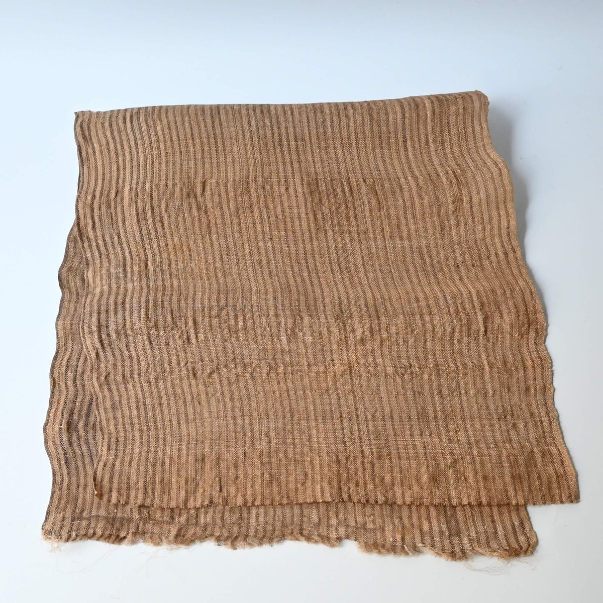 Full view of vintage collectable bashofu banana fibre textile, natural brown stripe.