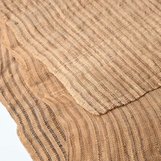 Close-up view of vintage collectable bashofu banana fibre textile, natural brown stripe.