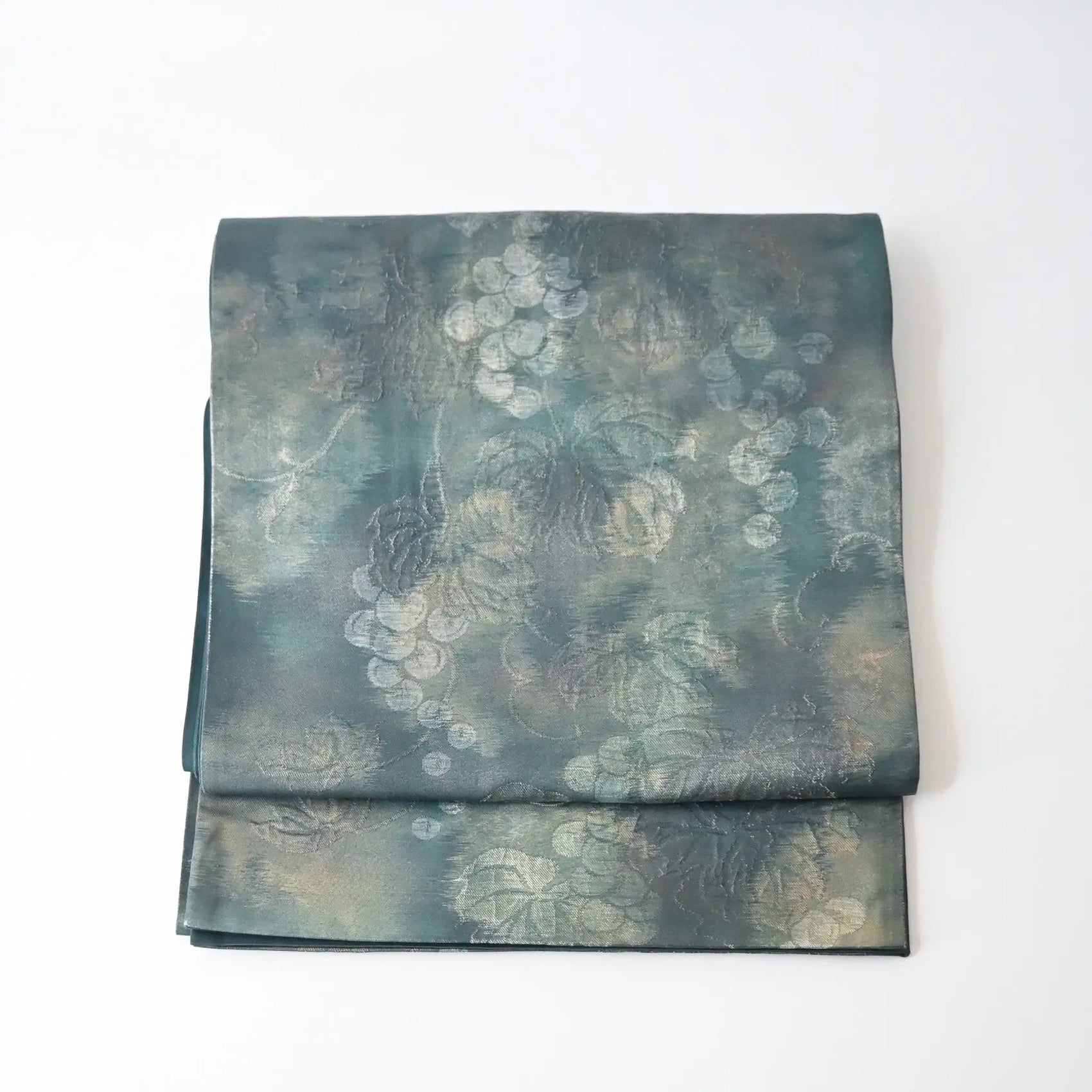Vintage muted teal blue silk Fukure-ori obi with grape vine motif.