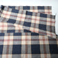 Detailed view of vintage three-panel indigo plaid check cotton piece from the mid-20th century.