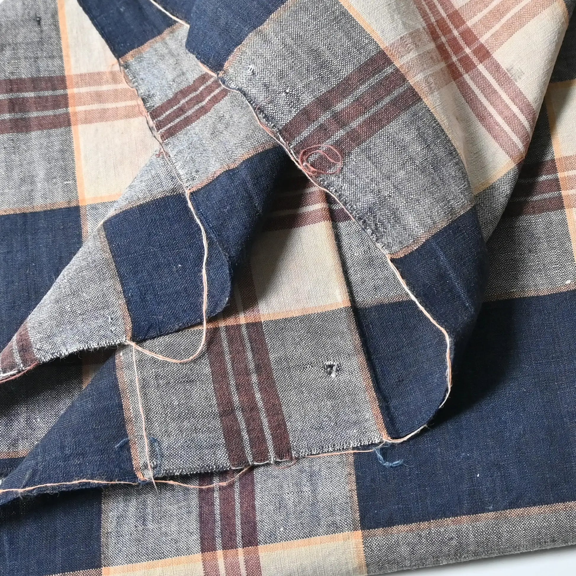 Detailed view of vintage three-panel indigo plaid check cotton piece from the mid-20th century.