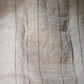Detail of vintage three-panel mosquito net kaya hemp, natural with green stripes design.