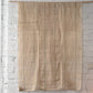 Full view of vintage three-panel mosquito net kaya hemp, natural with green stripes design.