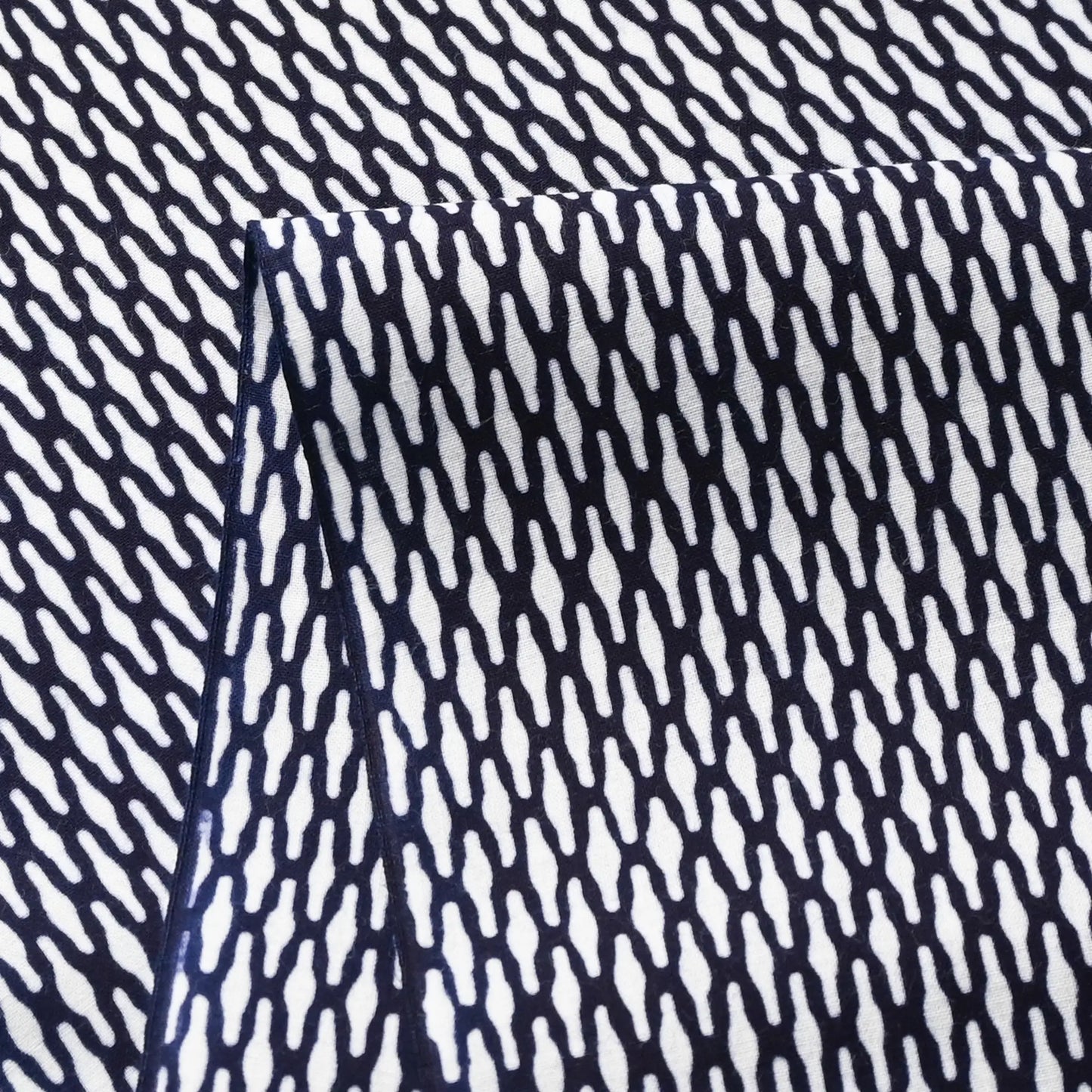 Close-up view of vintage traditional Japanese yukata cotton fabric sold by the metre.