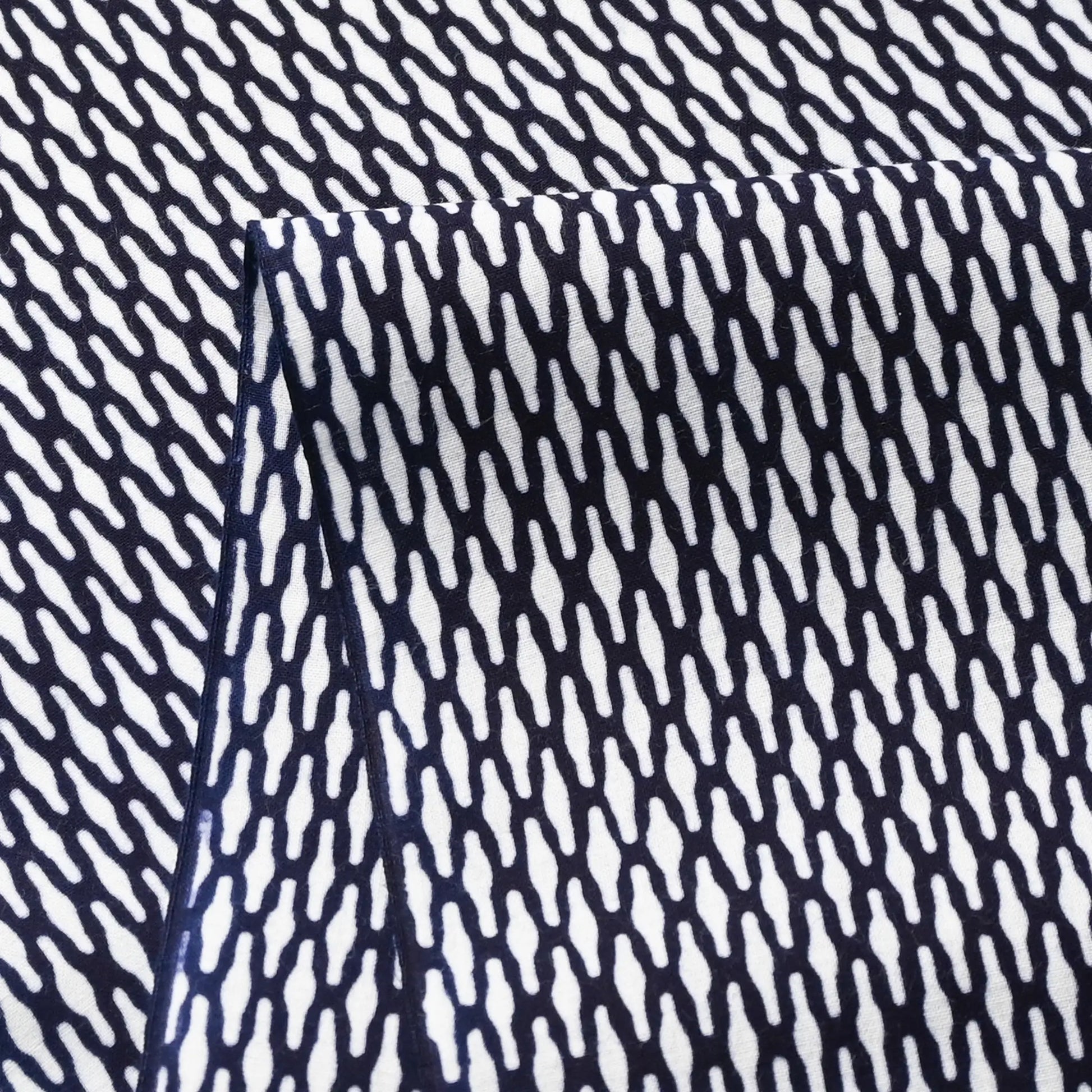 Close-up view of vintage traditional Japanese yukata cotton fabric sold by the metre.