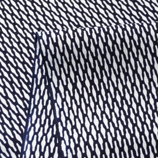Close-up view of vintage traditional Japanese yukata cotton fabric sold by the metre.