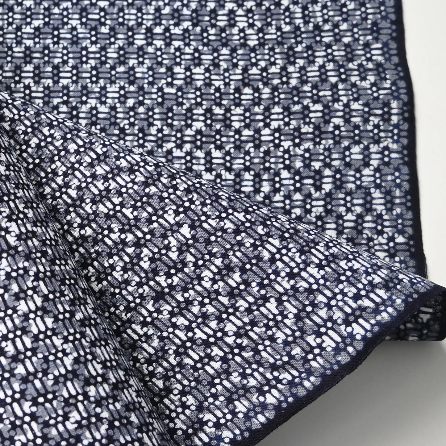 Detailed view of vintage traditional Japanese yukata cotton fabric sold by the metre.