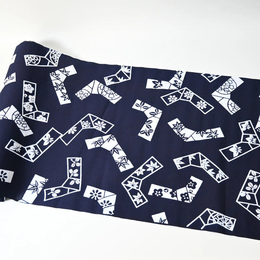 Vintage traditional yukata fabric rol with playful knot motifs filled with seasonal flowers.