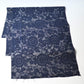 Vintage Japanese tsumugi kimono silk fabric piece with a classic chrysanthemum arabesque pattern.