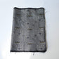 Vintage tsumugi silk kimono fabric with intricate woven geometric pattern.