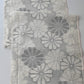 Vintage Japanese tsumugi silk kimono fabric with large round chrysanthemum pattern  in grey.