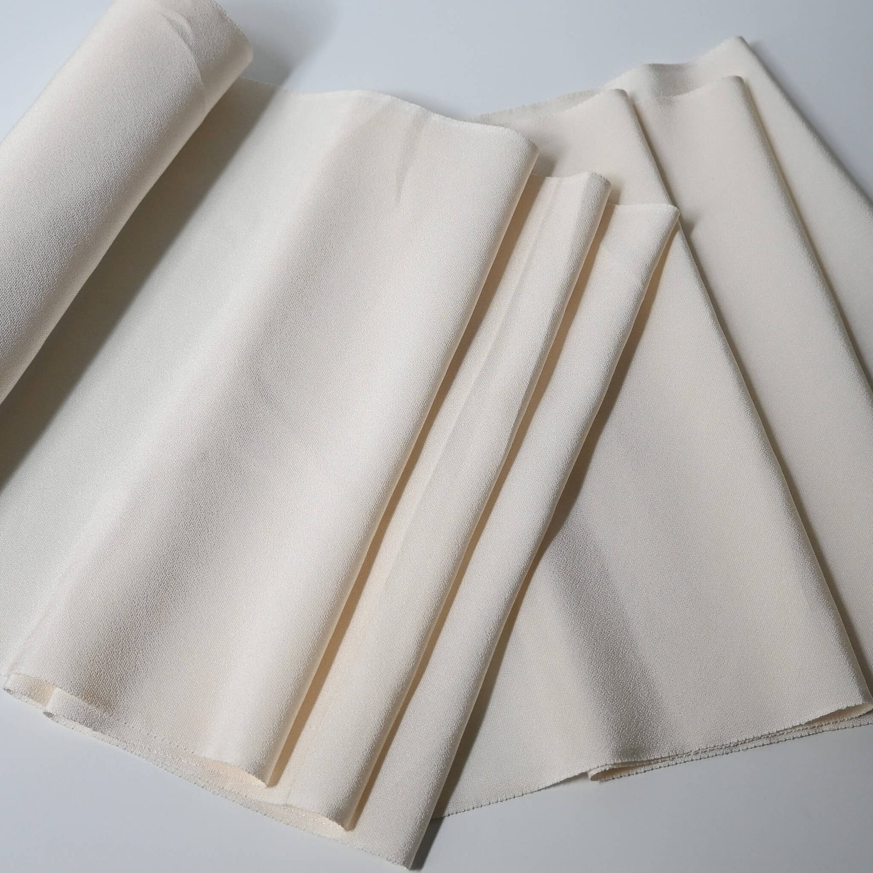 Vintage Japanese undyed plain silk kimono fabric in cream, ivory tone.