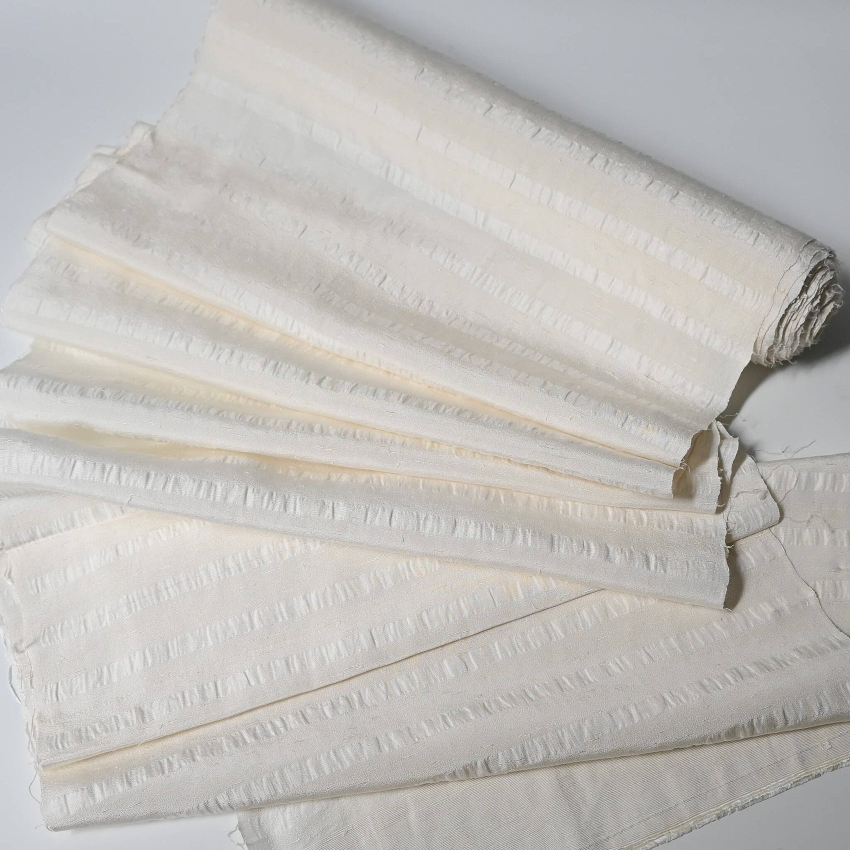 Vintage undyed textured stripe silk kimono fabric sold by the metre.