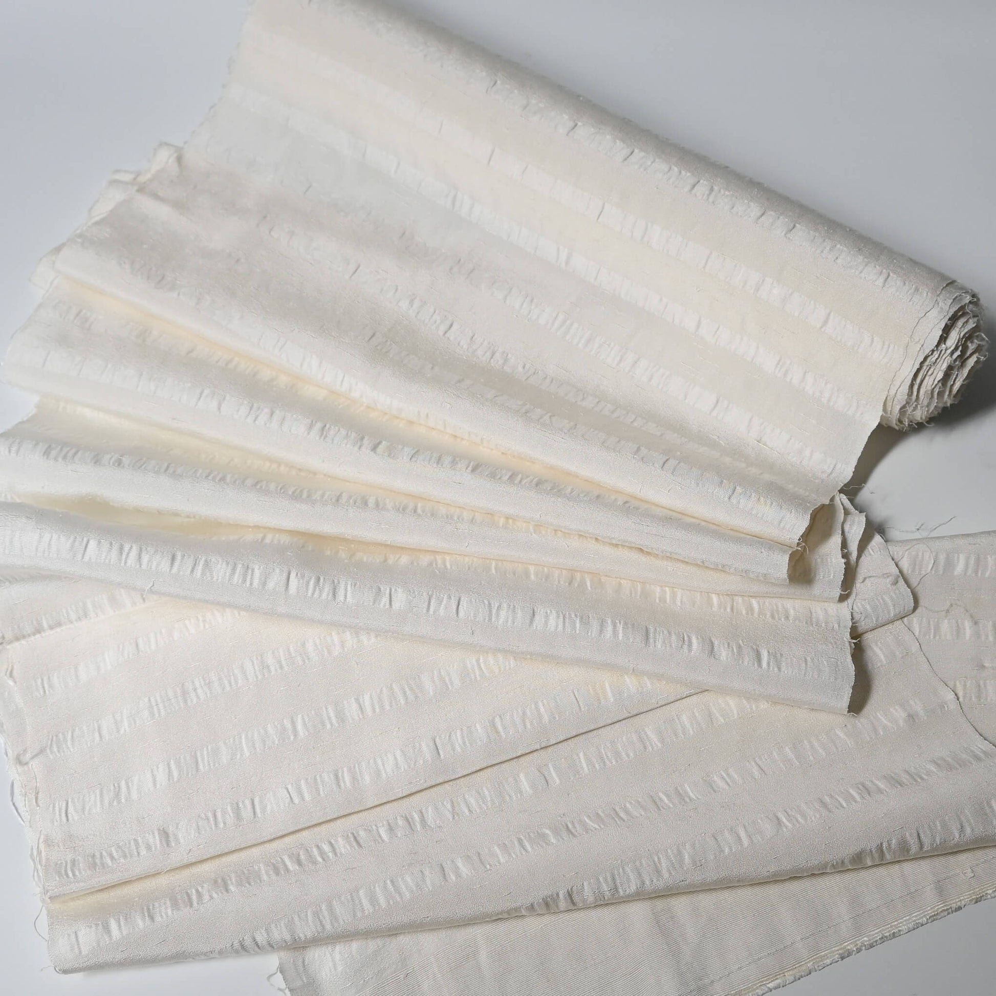 Vintage undyed textured stripe silk kimono fabric sold by the metre.