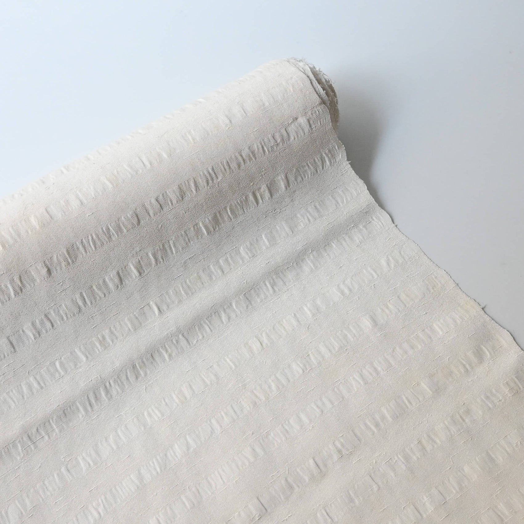 Vintage undyed textured stripe silk kimono fabric sold by the metre.