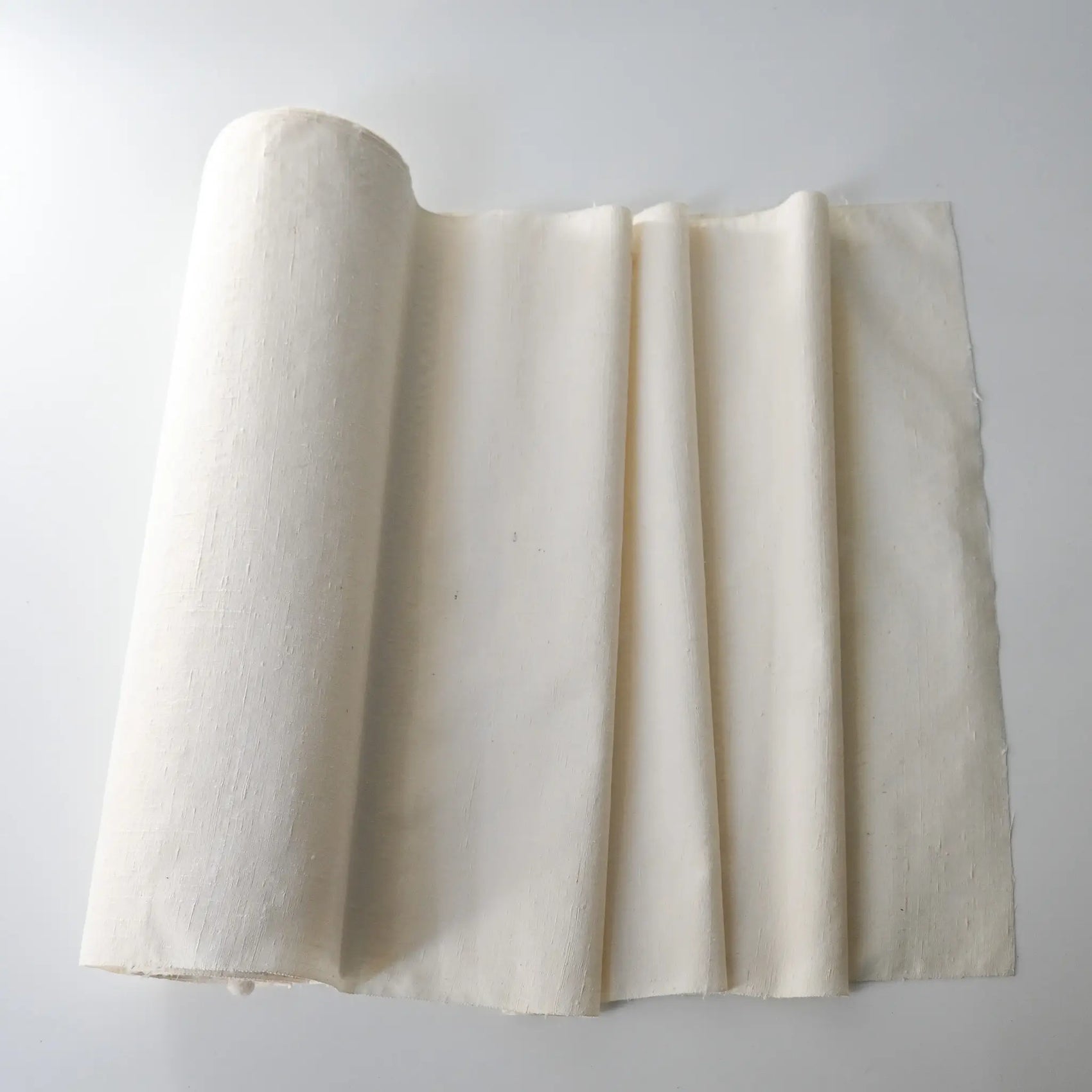 Vintage undyed yuki-tsumugi silk with textured slobs, crisp hand, ideal for dyeing projects.