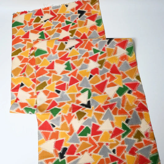Full view of vintage vibrant geometric Meisen silk kimono fabric piece from mid-20th century.