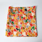Vintage vibrant geometric Meisen silk kimono fabric piece from mid-20th century.
