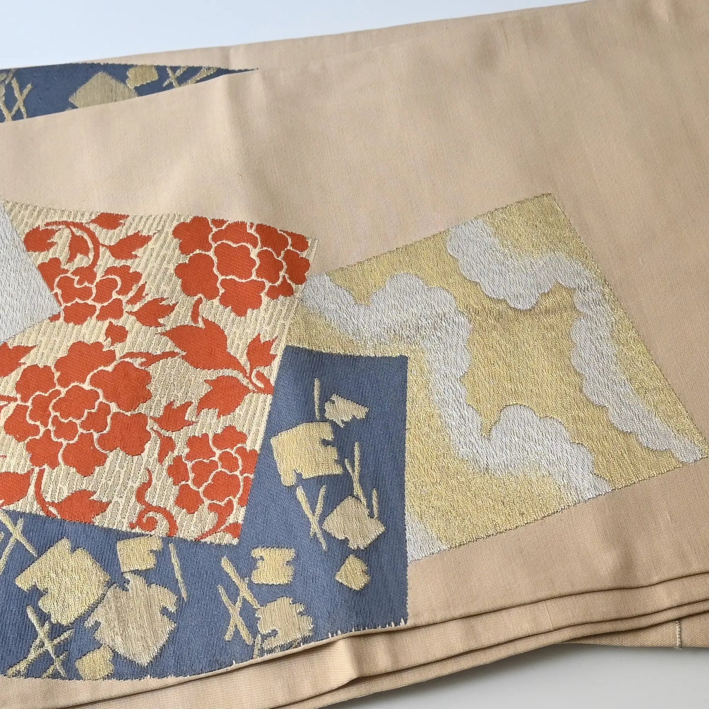 Detailed view of vintage Japanese women's cream beige silk fukuro obi with Shikishi square paper motif.