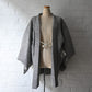 Vintage women's black and white silk haori with all-over kanoko shibori pattern.