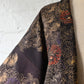 Vintage Japanese women’s haori in dark purple with an all-over chrysanthemum design in gold. Lightweight synthetic fabric.