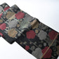 Vintage women's silk fukuro obi with stylised plum blossom woven with metallic silver and gold.