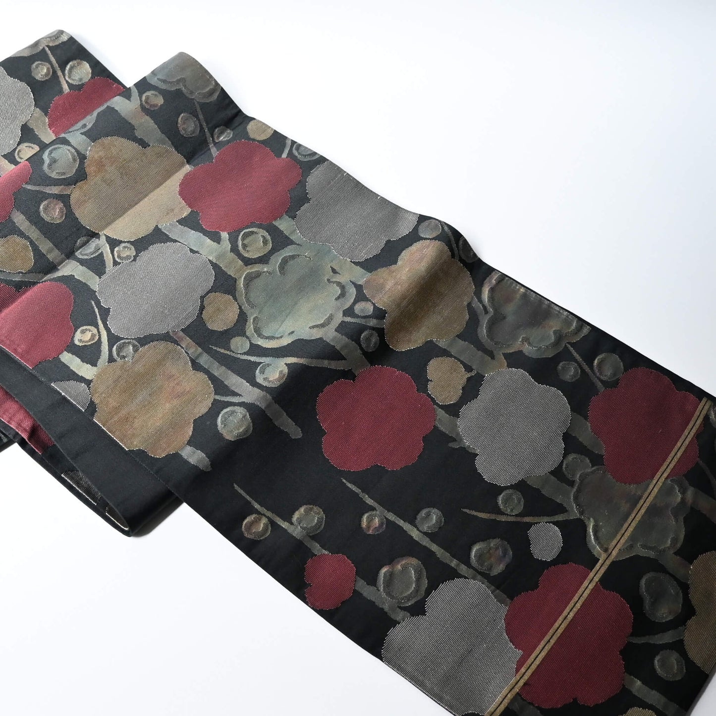 Vintage women's silk fukuro obi with stylised plum blossom woven with metallic silver and gold.
