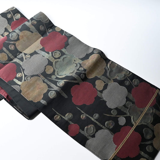 Vintage women's silk fukuro obi with stylised plum blossom woven with metallic silver and gold.
