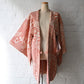 Vintage women's synthetic crepe haori in terracotta and ivory with floral and geometric patterns.