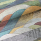 Detailed view of vintage Japanese women's silk metallic Bukuro obi with mountain design.