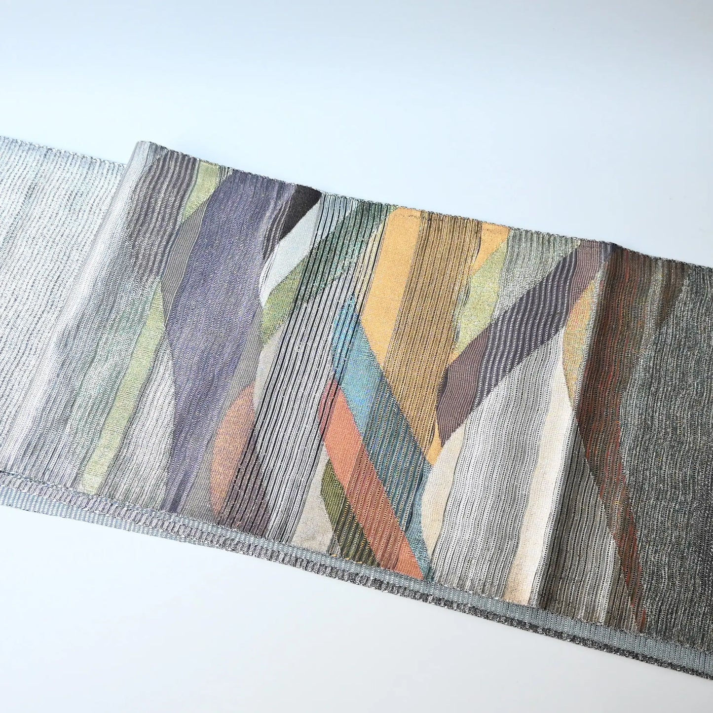 Vintage Japanese women's silk metallic Bukuro obi with mountain design.