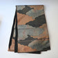 Full view of vintage Japanese women's silk fukuro obi in black and silver with cloud motif.