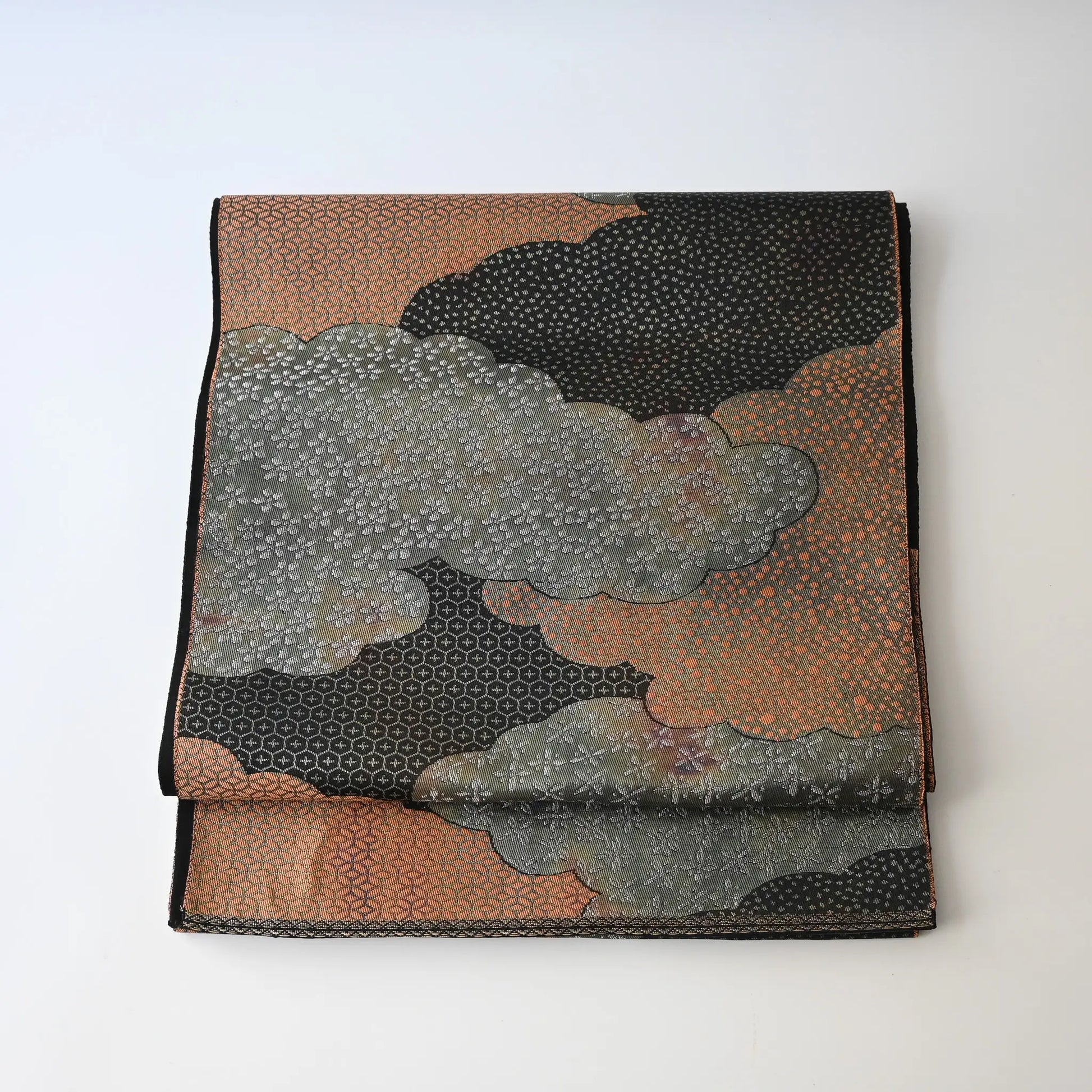 Vintage Japanese women's silk fukuro obi in black and silver with cloud motif.